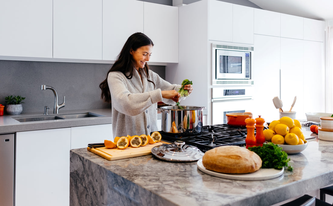 Woman Preparing a Meal in a Kitchen